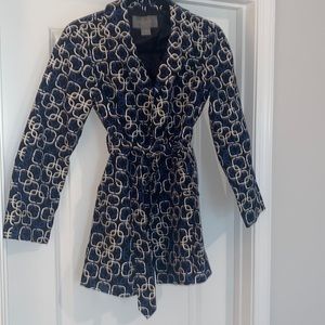 Like new, Ann Taylor dressy rain coat. Navy blue with white design.